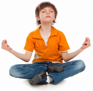 kids yoga meditating