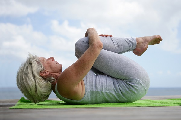 seniors yoga fetal pose